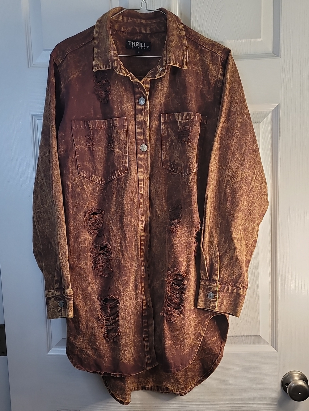 Thrill Jeans heavily distressed longline denim "shacket"
